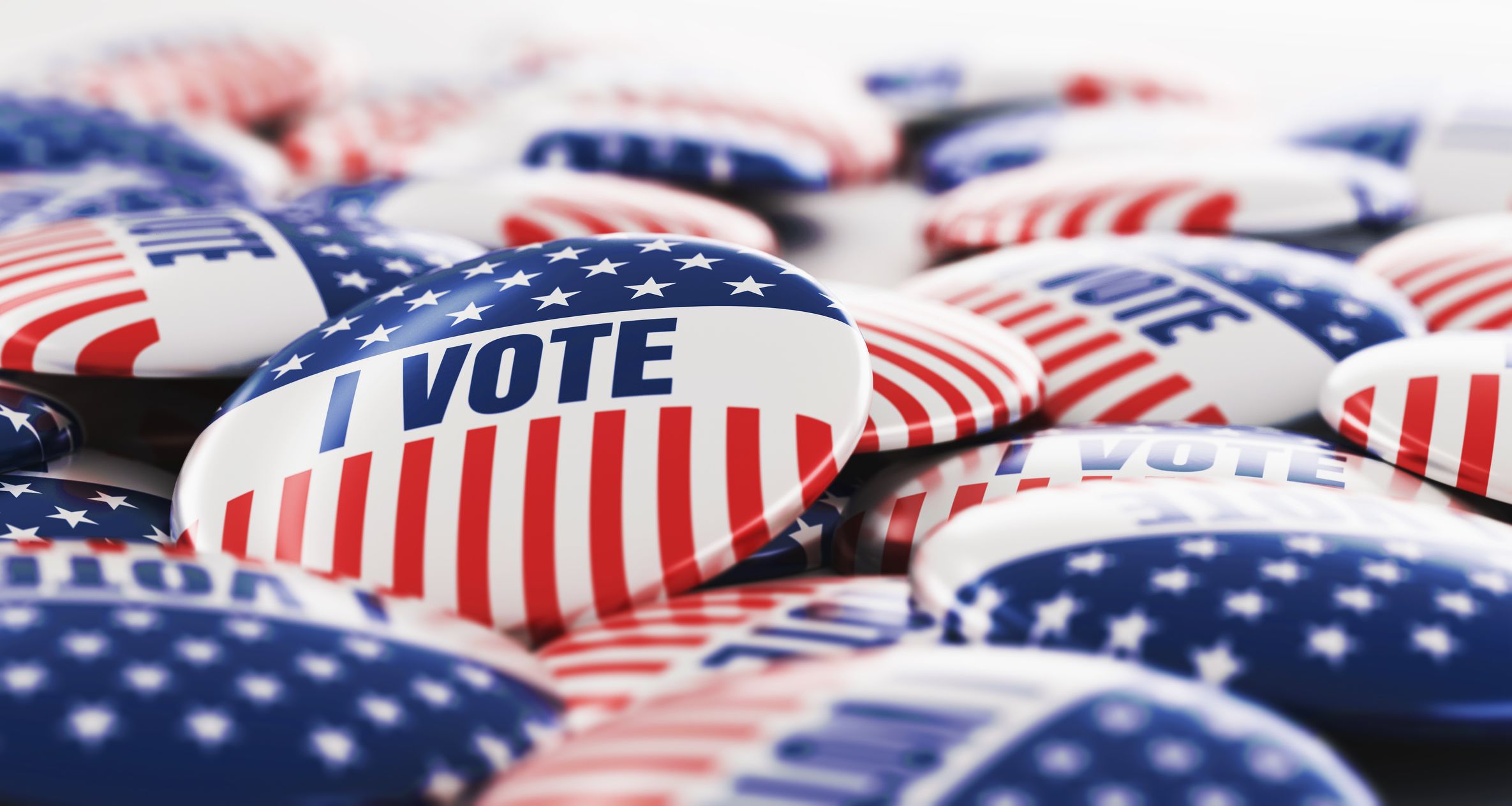 American flag themed buttons with the words "I VOTE"