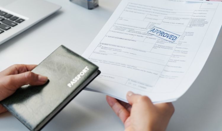 A passport and an approved visa application