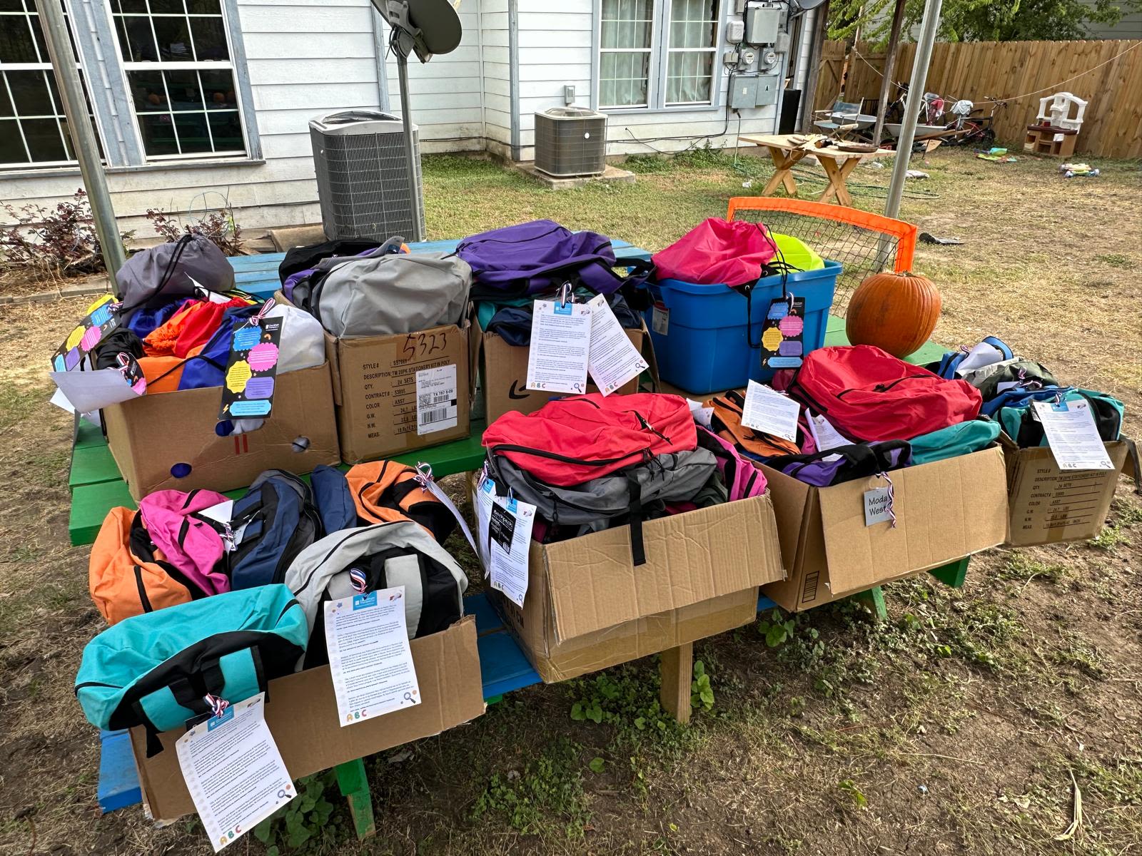 Cardboard boxes filled with clothes